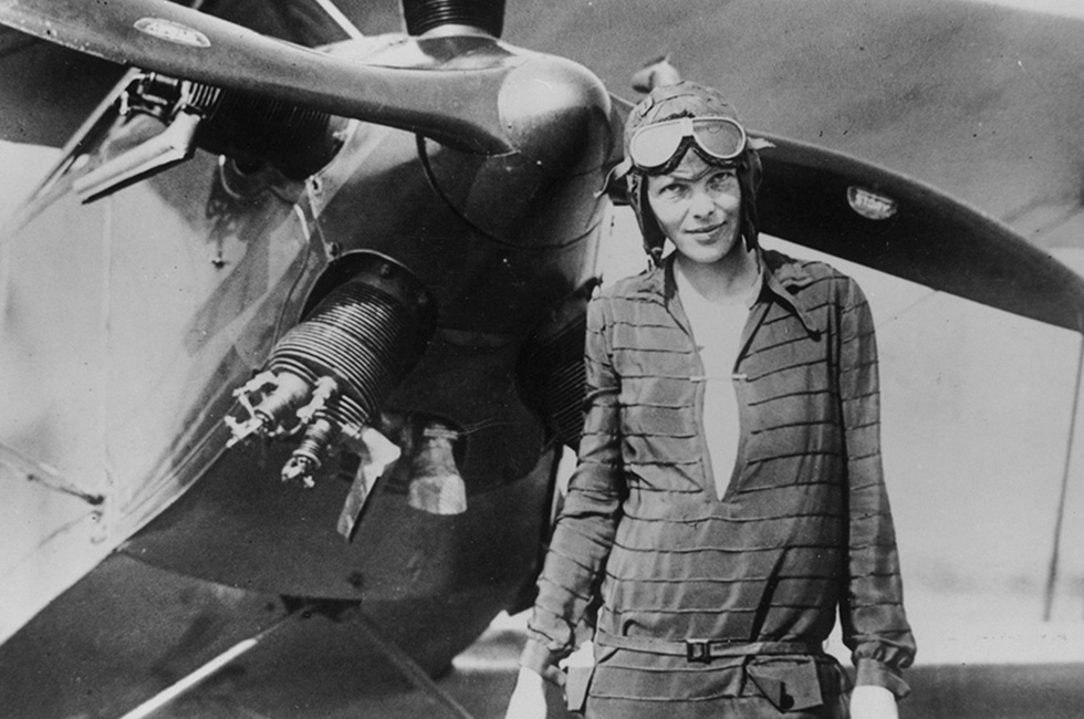 394033 03: (FILE PHOTO) Amelia Earhart stands June 14, 1928 in front of her bi-plane called "Friendship" in Newfoundland. Carlene Mendieta, who is trying to recreate Earhart's 1928 record as the first woman to fly across the US and back again, left Rye, NY on September 5, 2001. Earhart (1898 - 1937) disappeared without trace over the Pacific Ocean in her attempt to fly around the world in 1937. (Photo by Getty Images)